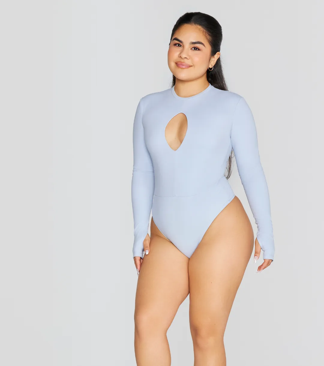 EXPOSED REVERSIBLE LONG SLEEVE BODYSUIT