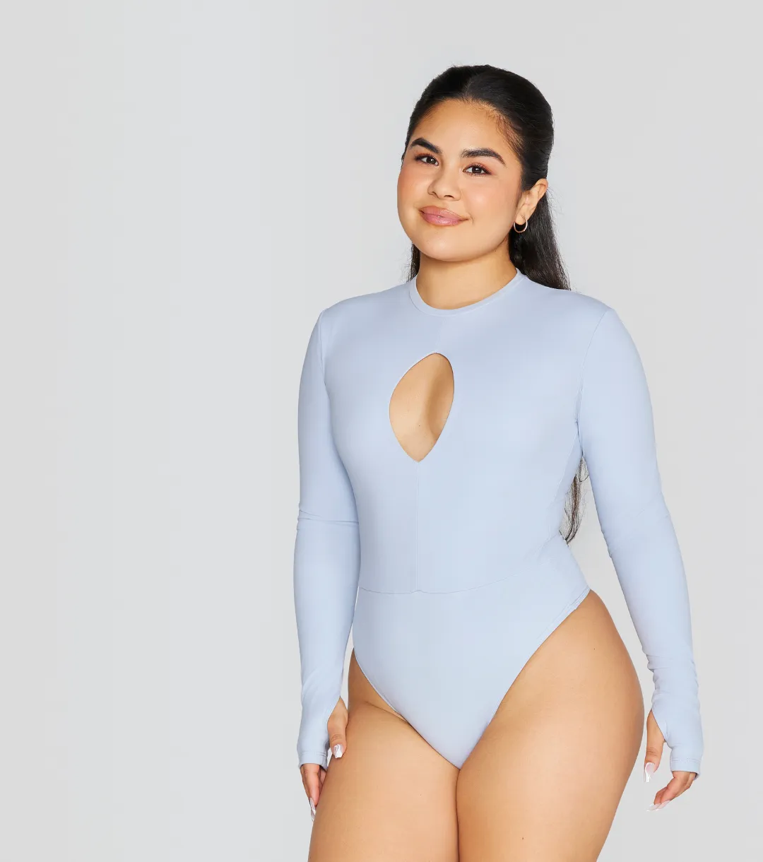 EXPOSED REVERSIBLE LONG SLEEVE BODYSUIT