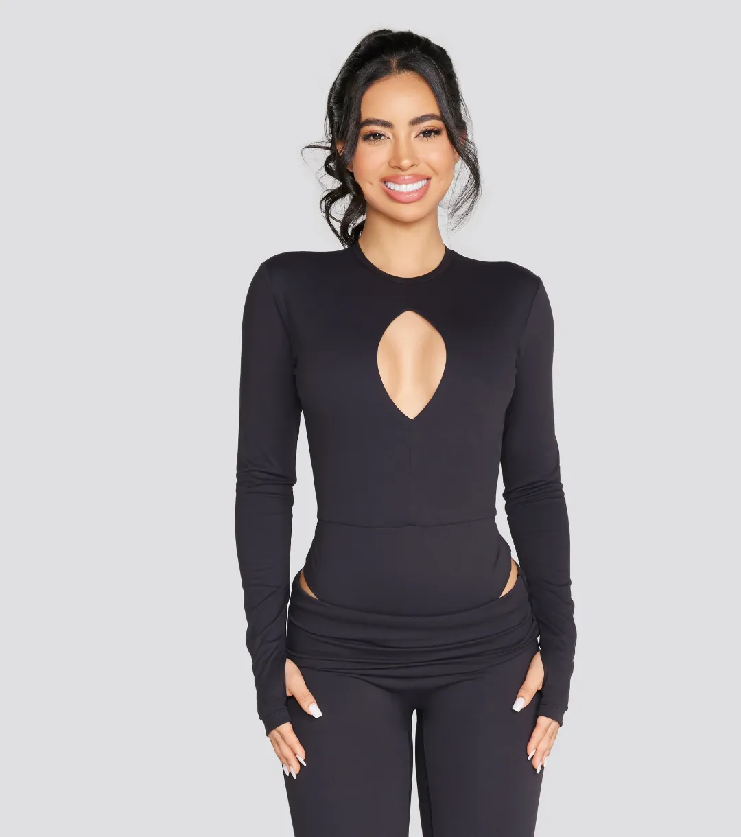 EXPOSED REVERSIBLE LONG SLEEVE BODYSUIT