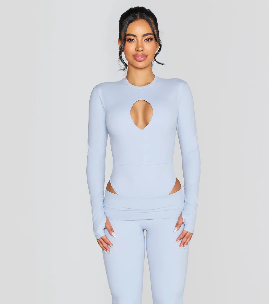 EXPOSED REVERSIBLE LONG SLEEVE BODYSUIT