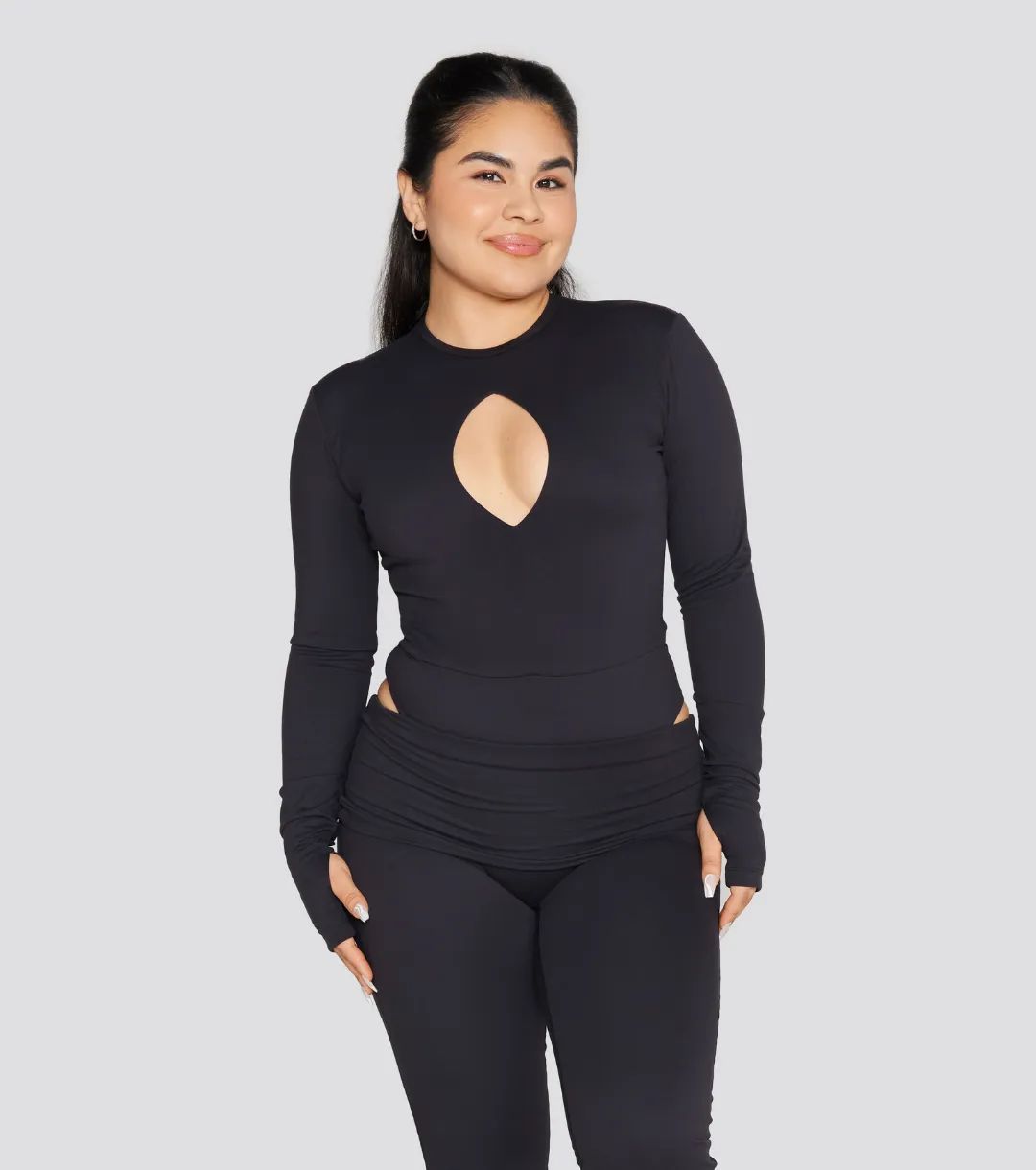EXPOSED REVERSIBLE LONG SLEEVE BODYSUIT