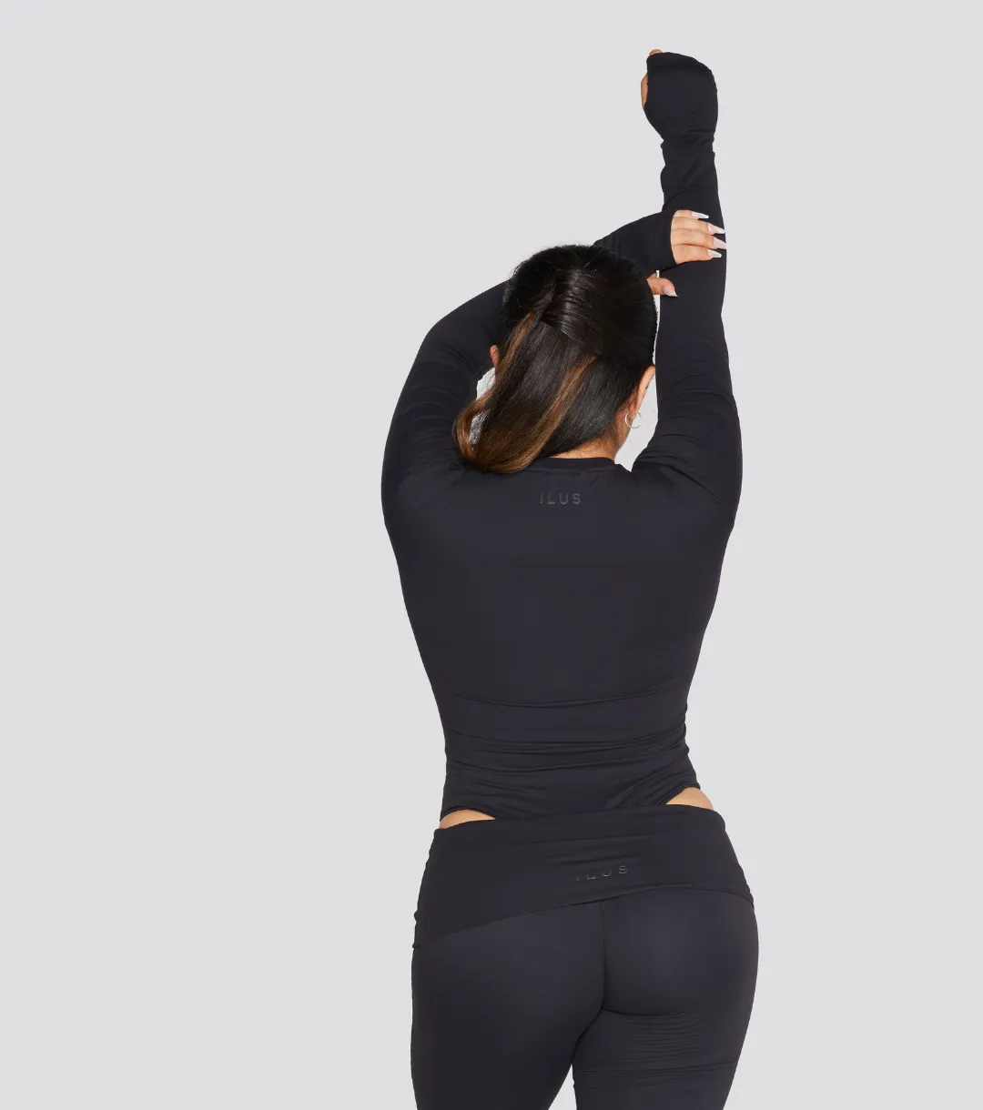 EXPOSED REVERSIBLE LONG SLEEVE BODYSUIT