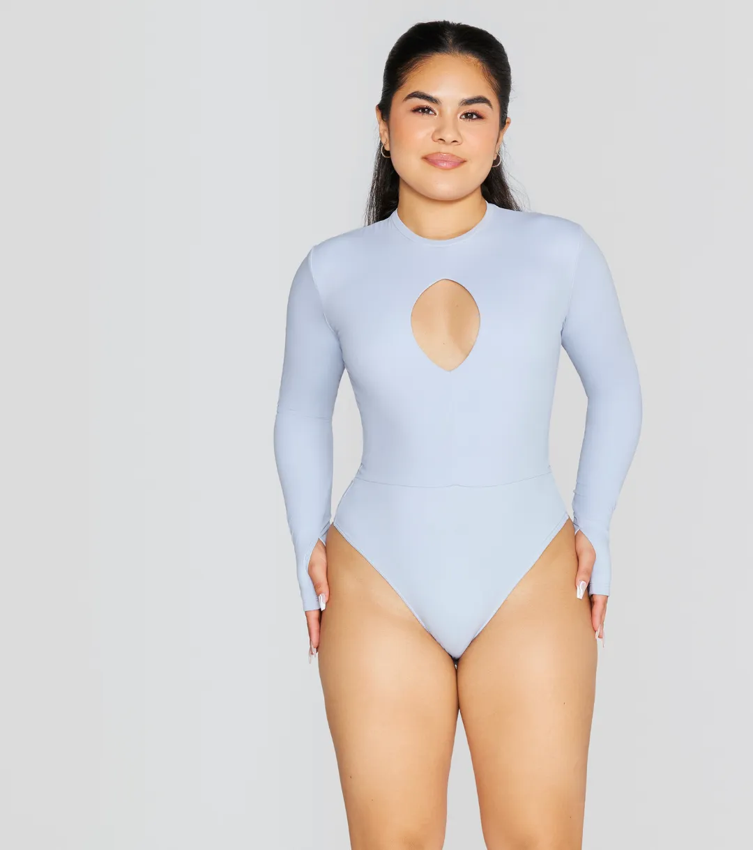 EXPOSED REVERSIBLE LONG SLEEVE BODYSUIT
