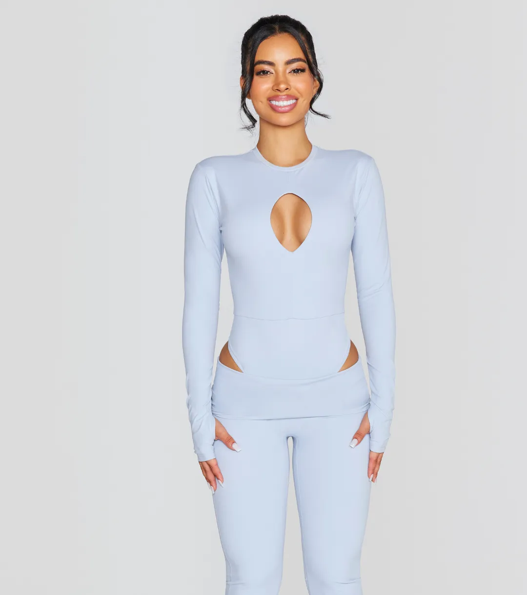 EXPOSED REVERSIBLE LONG SLEEVE BODYSUIT