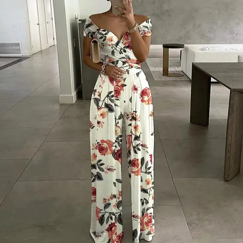 Rechte jumpsuit met bloemenprint en vetersluiting in de taille